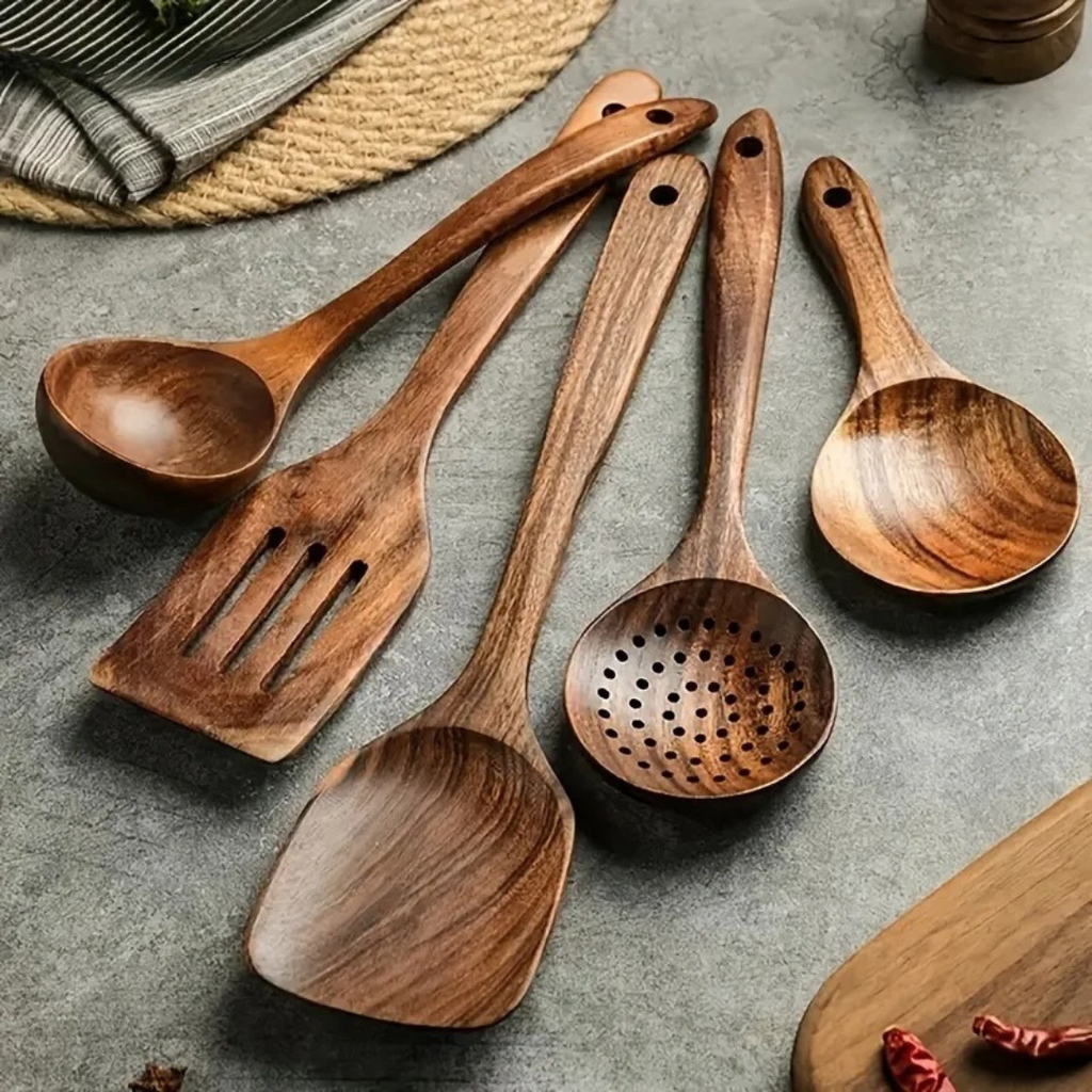 5-piece walnut kitchenware set featuring rustic design tools for cooking and serving, including a spatula, spoon, tongs, and more. 3